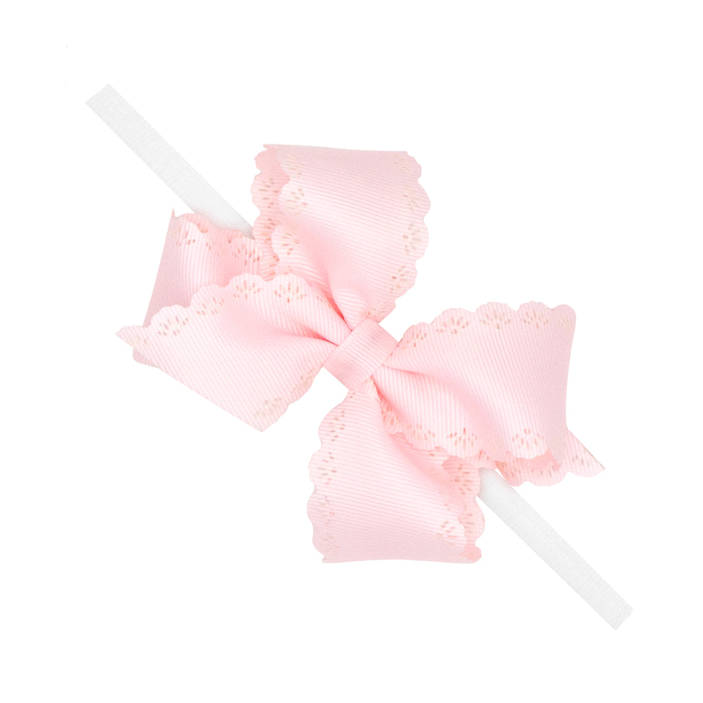 Small Grosgrain Hair Bow with Embossed Eyelet Edge on White Nylon Band